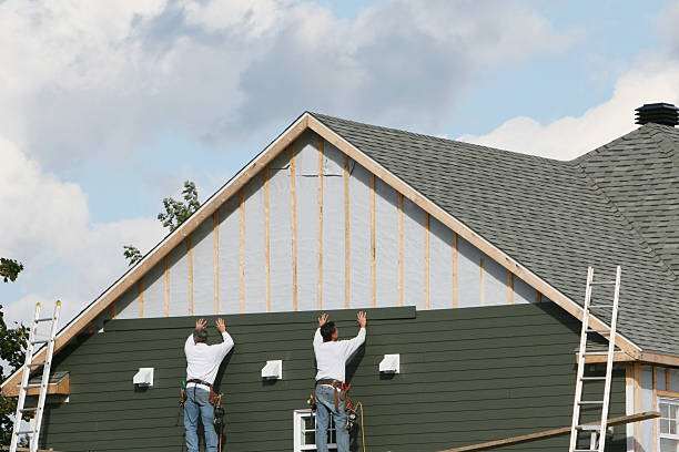 Professional Emergency Siding Repair technician working in Canton, MA